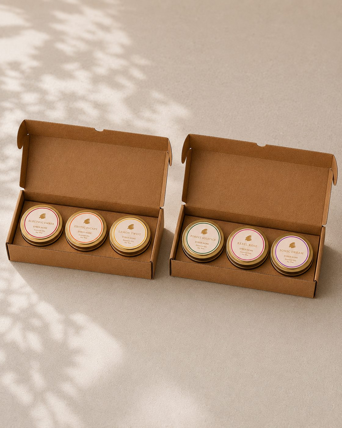 Ember Noire candle discovery set, both kraft box candle sampler sets side by side, Bright Set and Slow Set