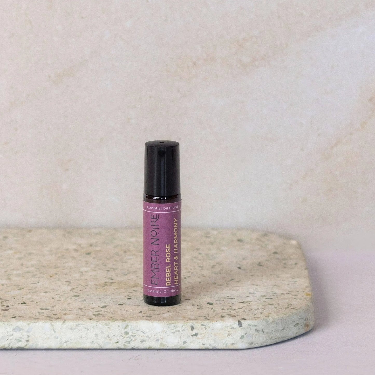 Rebel Rose aromatherapy roller styled for daily self-care