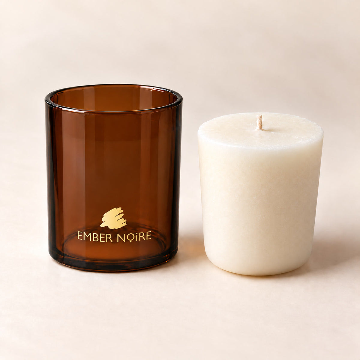 Candle refill beside the amber signature jar