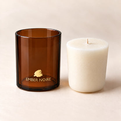 Candle refill beside the amber signature jar